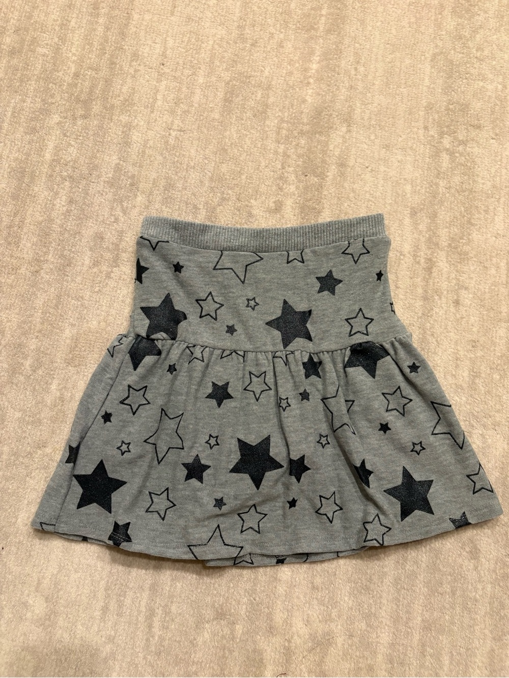 Chaser Brand skort with black and grey stars. Size 8. Barely worn!